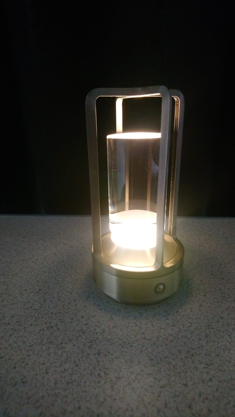 Customer photo review of Modern Cordless Metal Nordic Desk & Table Lamp - Cordless, Rechargeable, LED with Touch Control & Dimming Feature, Suitable for Bedroom, Home, Outdoor - Ideal Night Light for Restaurant and Home Usage