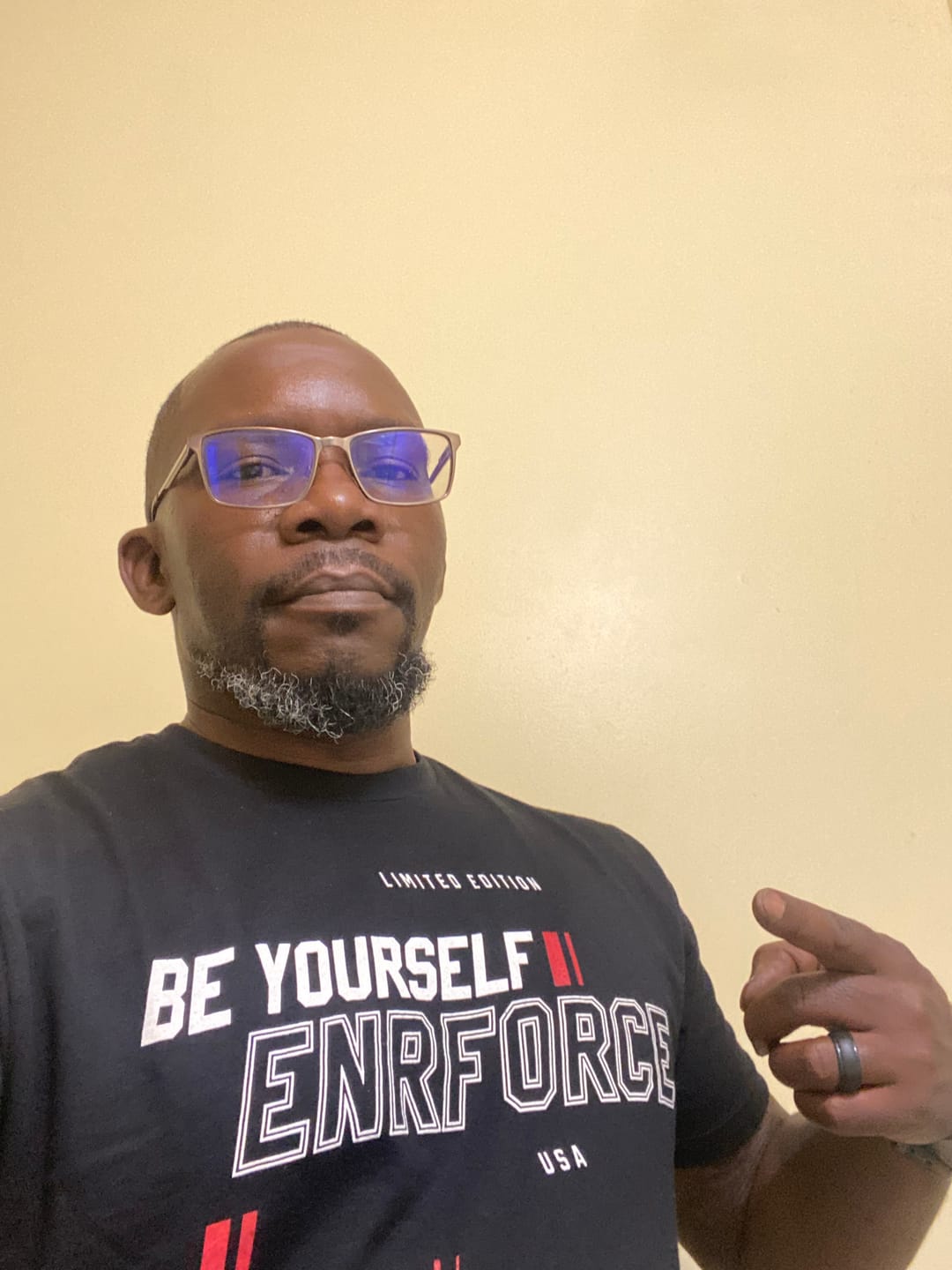 Customer photo review of In God We Trust Tee
