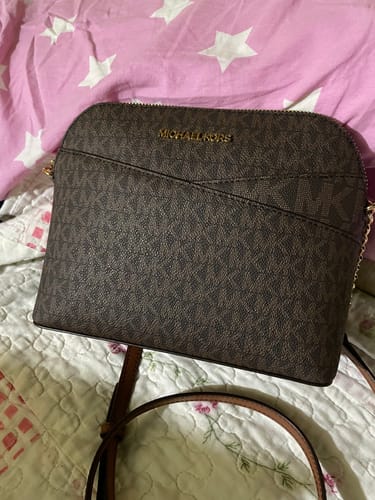 Customer photo review of Jet Set Travel Medium Logo Dome Crossbody Bag (BROWN)