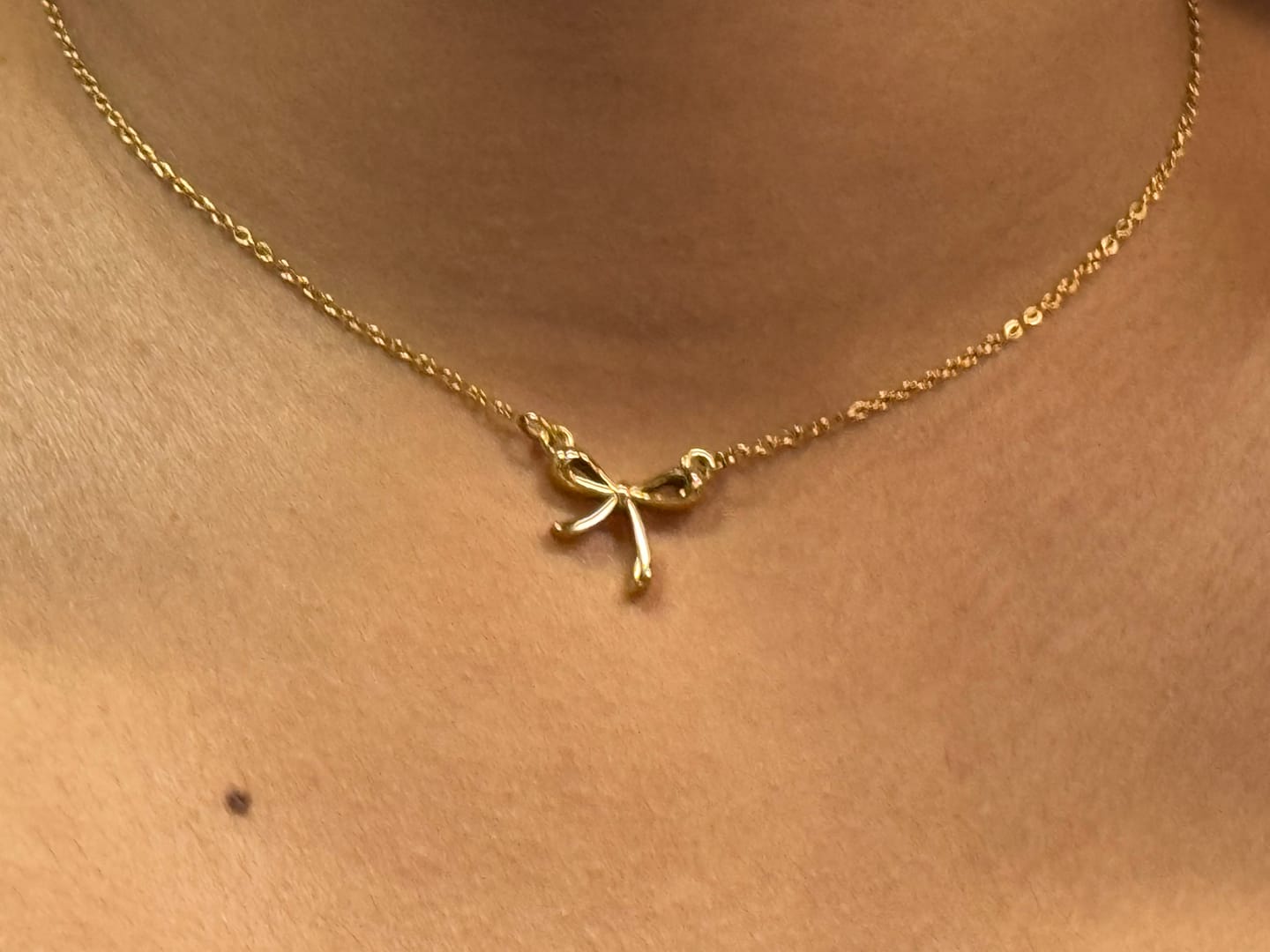 Customer photo review of Serenity Bow Pendant Necklace