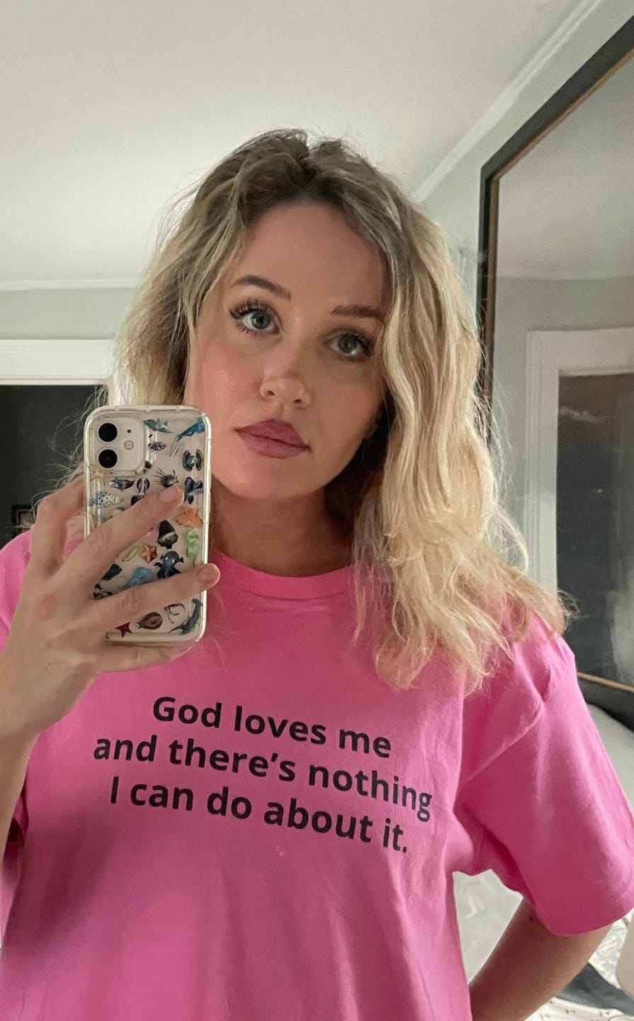 Customer photo review of GOD LOVES ME T-SHIRT