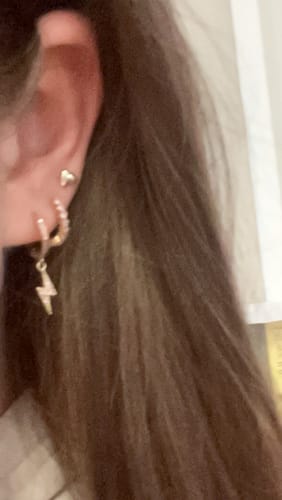 Customer photo review of Talitha Pink Gold Lightning Bolt Huggie Earrings