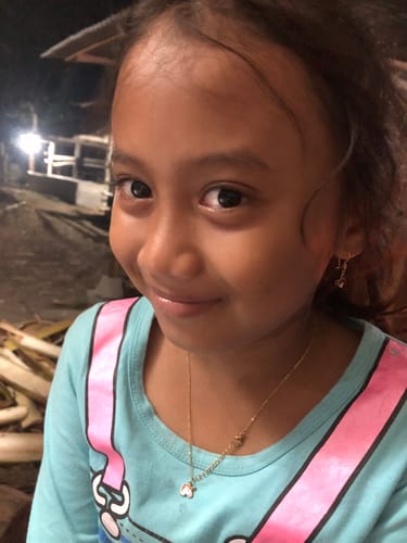 Customer photo review of Baby Unicorn Necklace