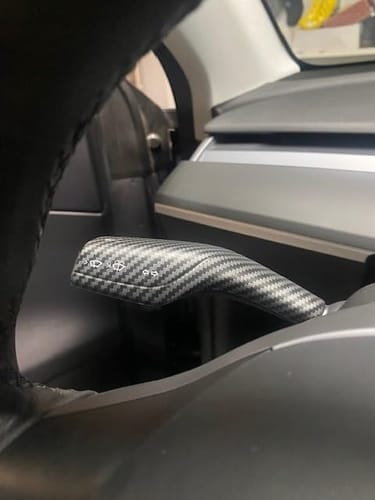 Customer photo review of EVAAM® Gloss Real Carbon Fiber Tesla Gear Shift Cover Trim for Model 3/Y [2017-2023] (2Pcs)