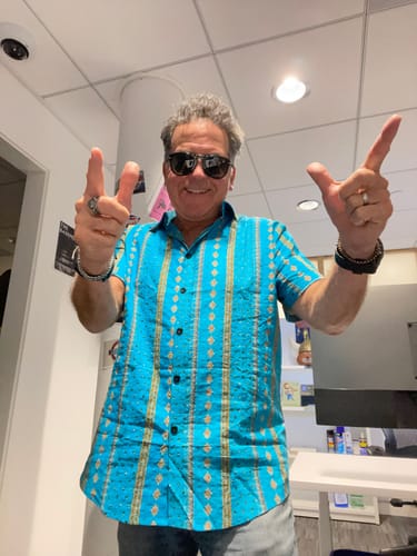 Customer photo review of Men's Retro Striped Print Button Up 70s Vintage Short Sleeve Shirt