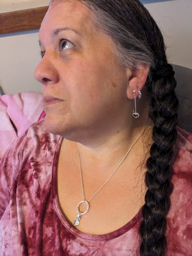 Customer photo review of Sterling Silver Hawaiian Scroll Heart-Chain-Heart Post Earrings