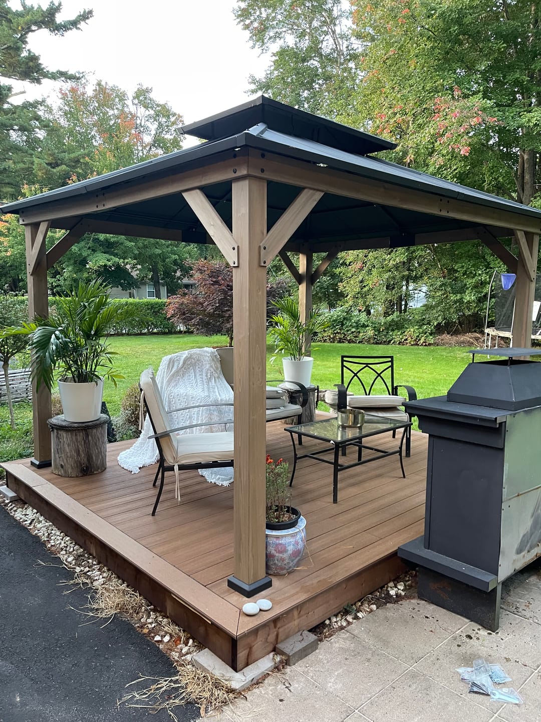 Customer photo review of SUNJOY 10x12 Outdoor Cedar Framed Wooden Gazebo with 2-Tier Metal Roof and Ceiling Hook - Weathered Cedar