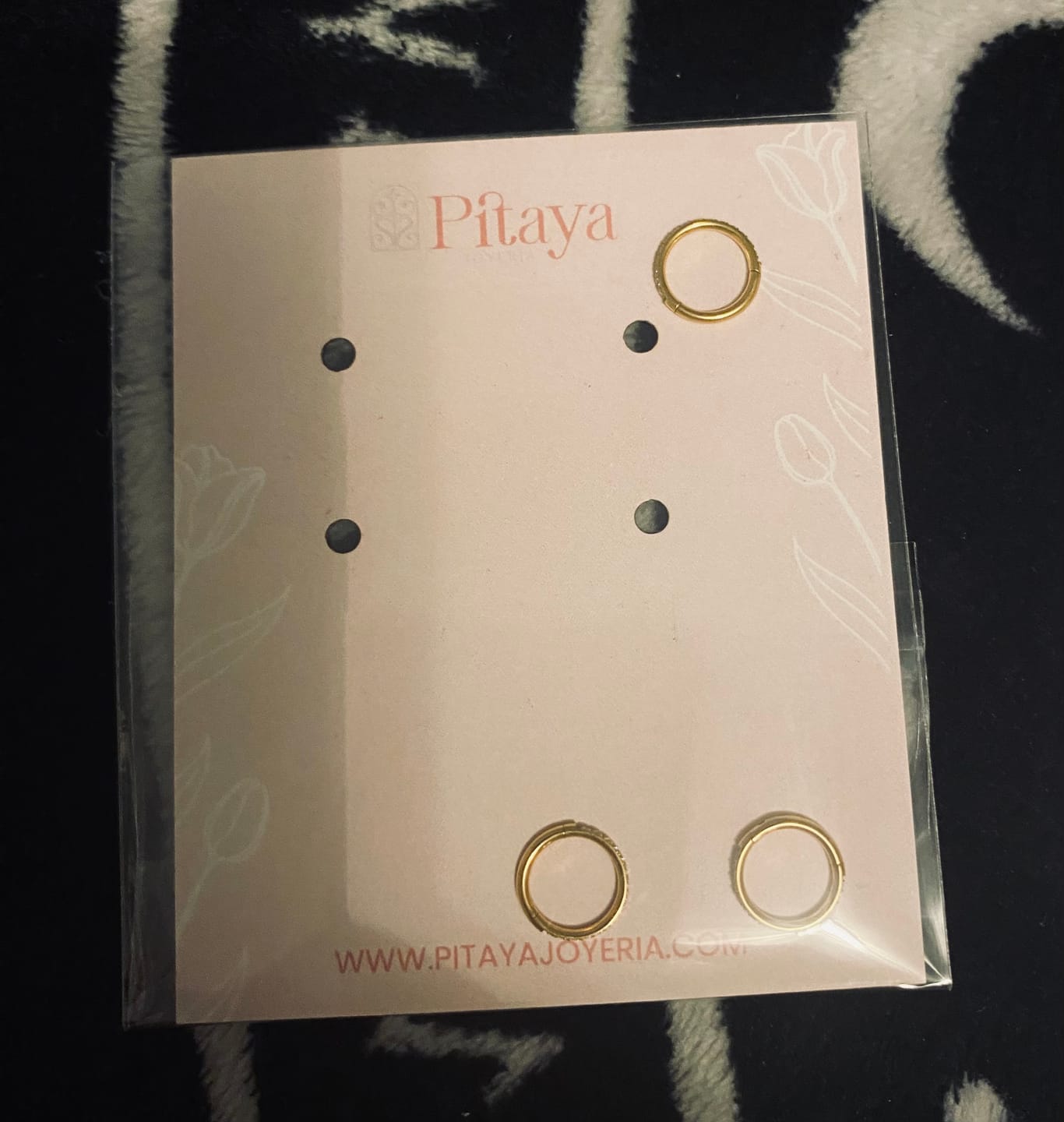 Customer photo review of Piercing Infinity con Zirconias Titanio