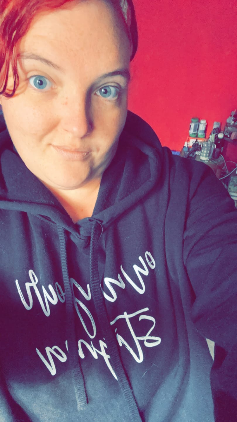 Customer photo review of Own Your Stigma Crop Hoodie