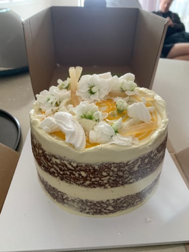 Customer photo review of lemon meringue cake