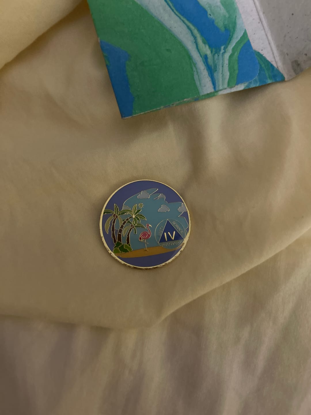 Customer photo review of 4 Year Beach Themed Specialty Tri-Plated AA Recovery Medallion - Four Year Chip/Coin