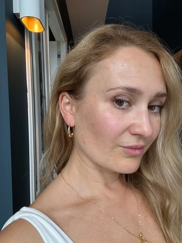 Customer photo review of Classic Drop Hoop Earrings