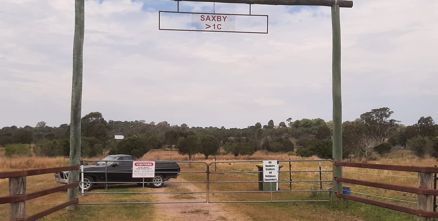 Customer photo review of Farm Biosecurity Metal Sign