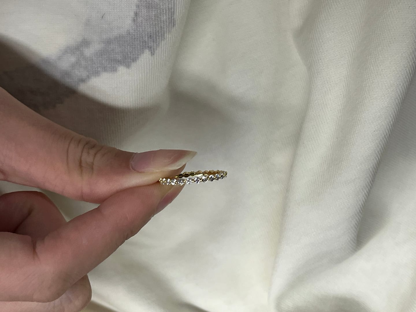 Customer photo review of Louily Classic Round Cut Full Eternity Wedding Band In Sterling Silver