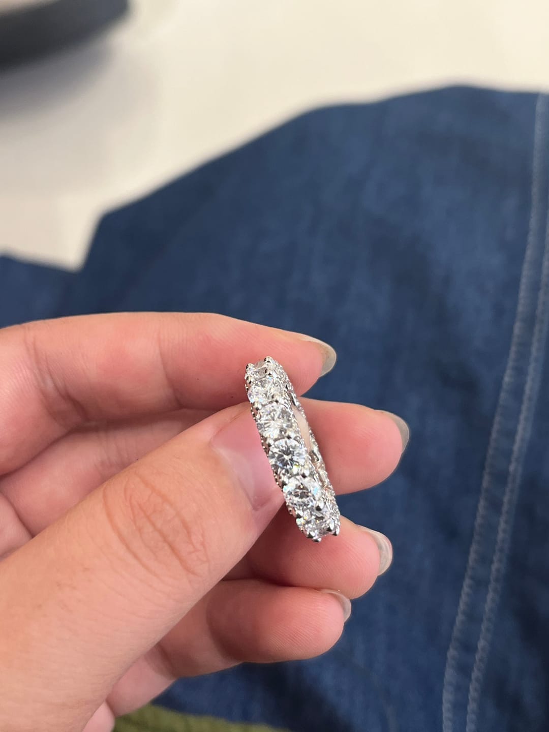 Customer photo review of Louily 5 Ct Luxury Eternity Round Cut Wedding Band In Sterling Silver