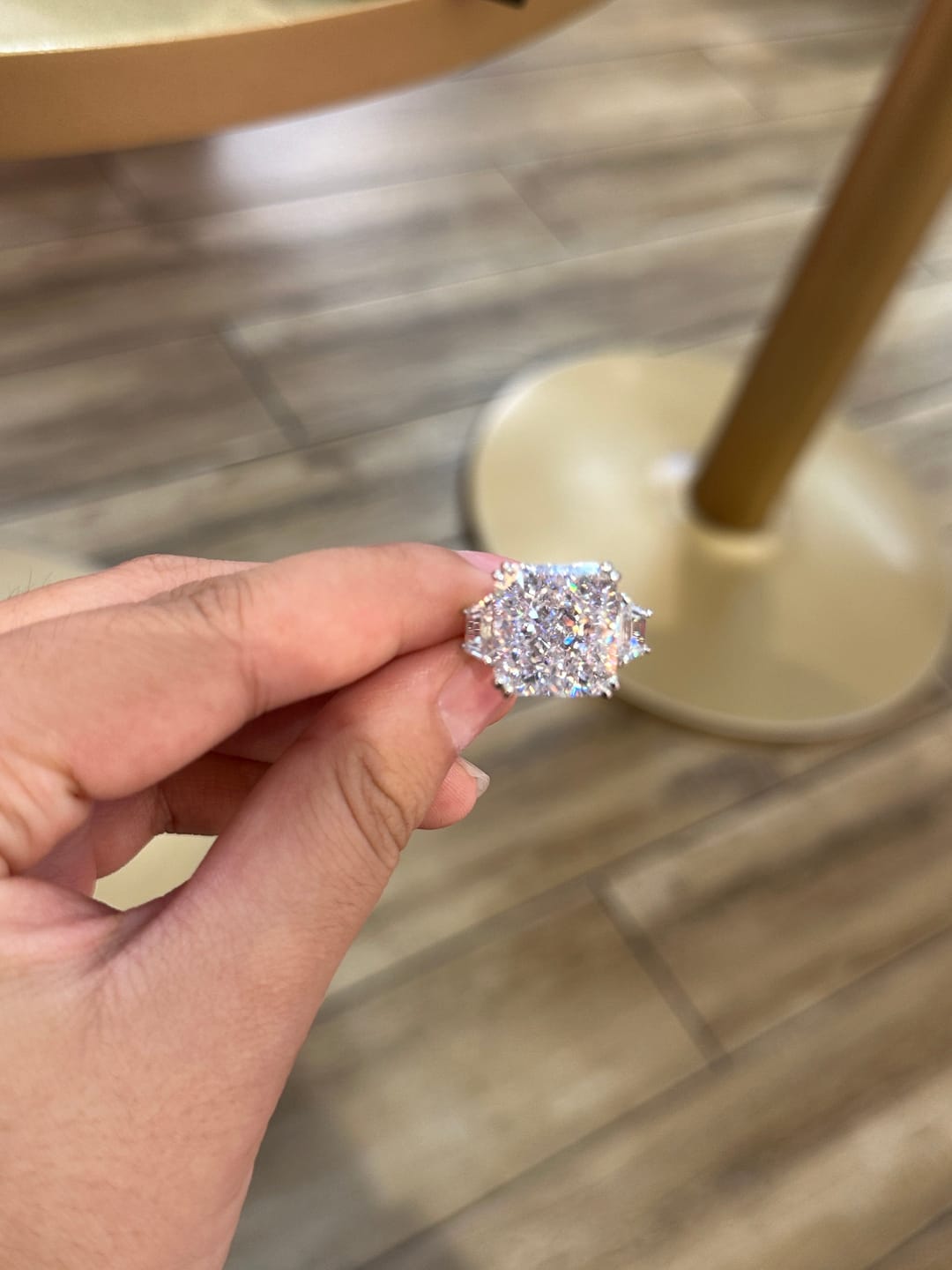 Customer photo review of S925 6.5/12.0 Ct Radiant Cut Crushed Ice Simulated Diamond Three-Stone Engagement Travel Ring