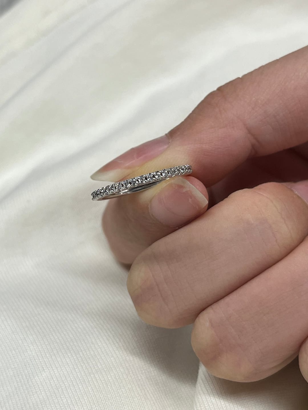 Customer photo review of Louily 0.5 Ct Round Cut Classic Full Eternity Thin Wedding Band For Women In Sterling Silver