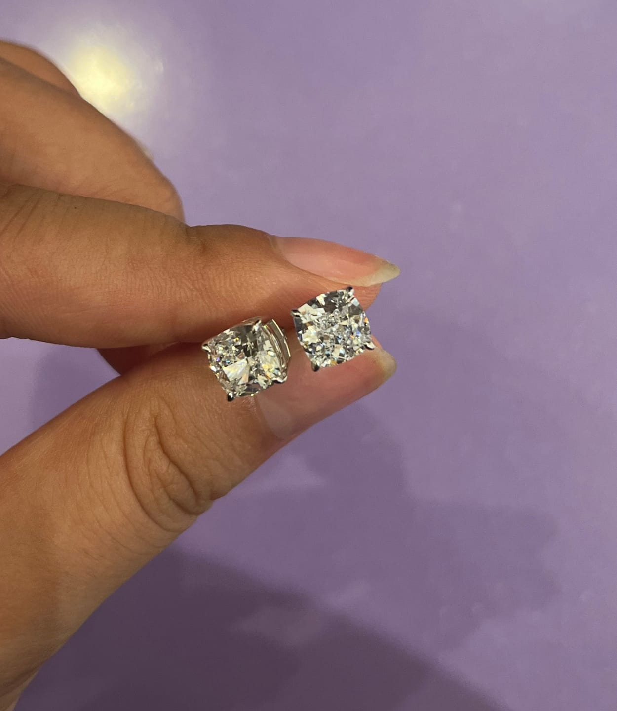 Customer photo review of Louily 1.5 CT Cushion Cut Sterling Silver Women's Stud Earrings