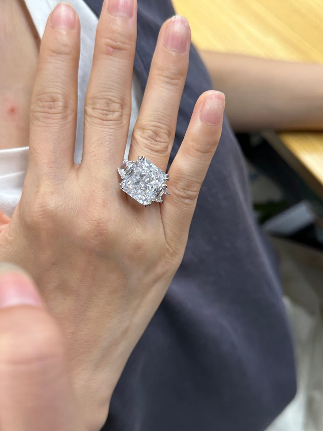 Customer photo review of S925 6.5/12.0 Ct Radiant Cut Crushed Ice Simulated Diamond Three-Stone Engagement Travel Ring