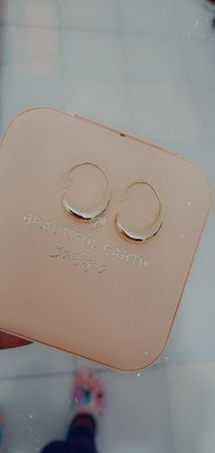 Customer photo review of Classic Drop Hoop Earrings