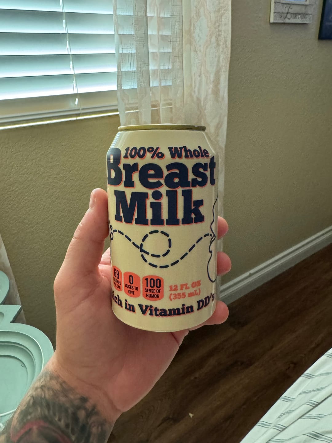 Customer photo review of Breast Milk Beersy Silicone Sleeve Hide-a-Beer Can Cooler
