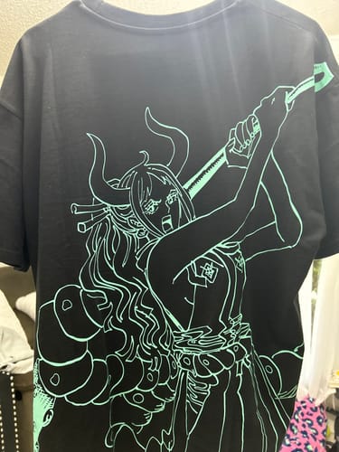 Customer photo review of Oden Tee