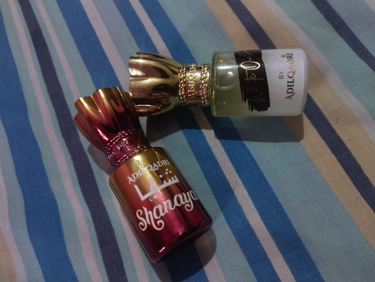 Customer photo review of 2 Pcs Attar Set Shanaya And White Oudh 5.5 Ml Each
