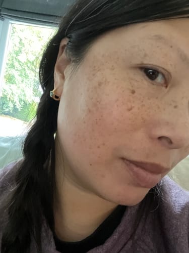 Customer photo review of Love Heart Huggie Hoops with Malachite