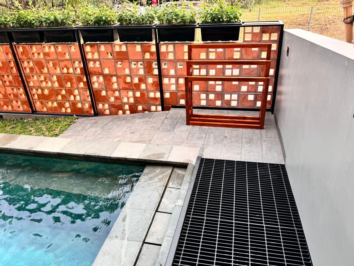 Customer photo review of Exclusive Tiered Teak Towel Rack