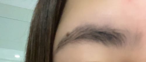 Customer photo review of Suero para pestañas y cejas