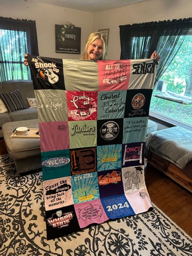 T-shirt quilt with music, diversity themes by Amy from WI