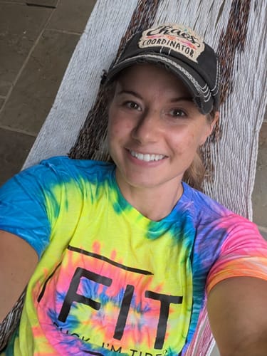 Customer photo review of Salty Savage Ladies "FIT Fuck, I’m Tired" Spiral Tie Dye Crop Tee