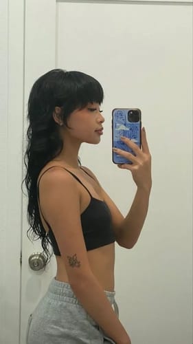 Customer photo review of Luvwin Pixie Cut Wigs Glueless Mullet Wigs With Bangs For Black Women