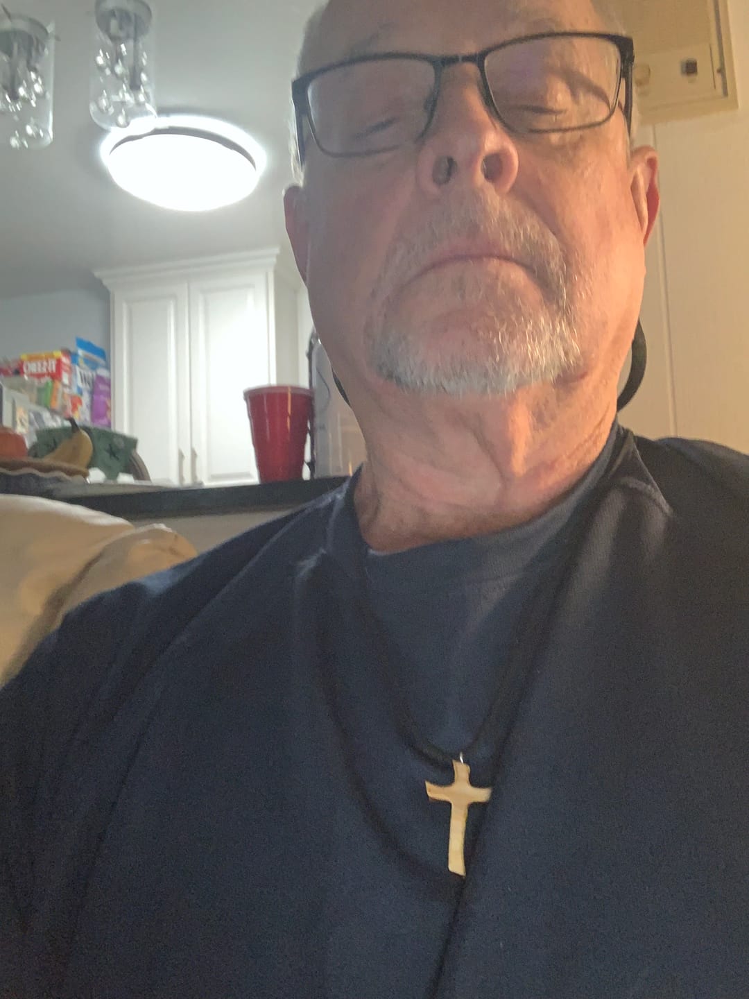 Customer photo review of Olive Wood Cross Pendant