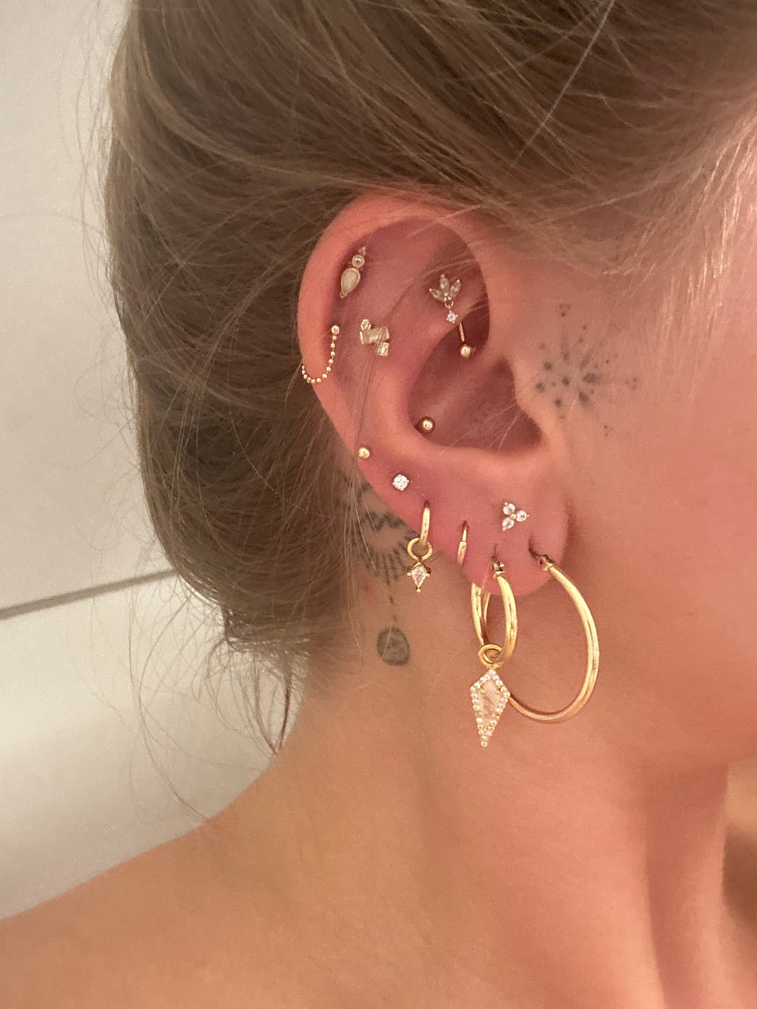 Customer photo review of AURA Mini Moonstone Pavé Kite Charm