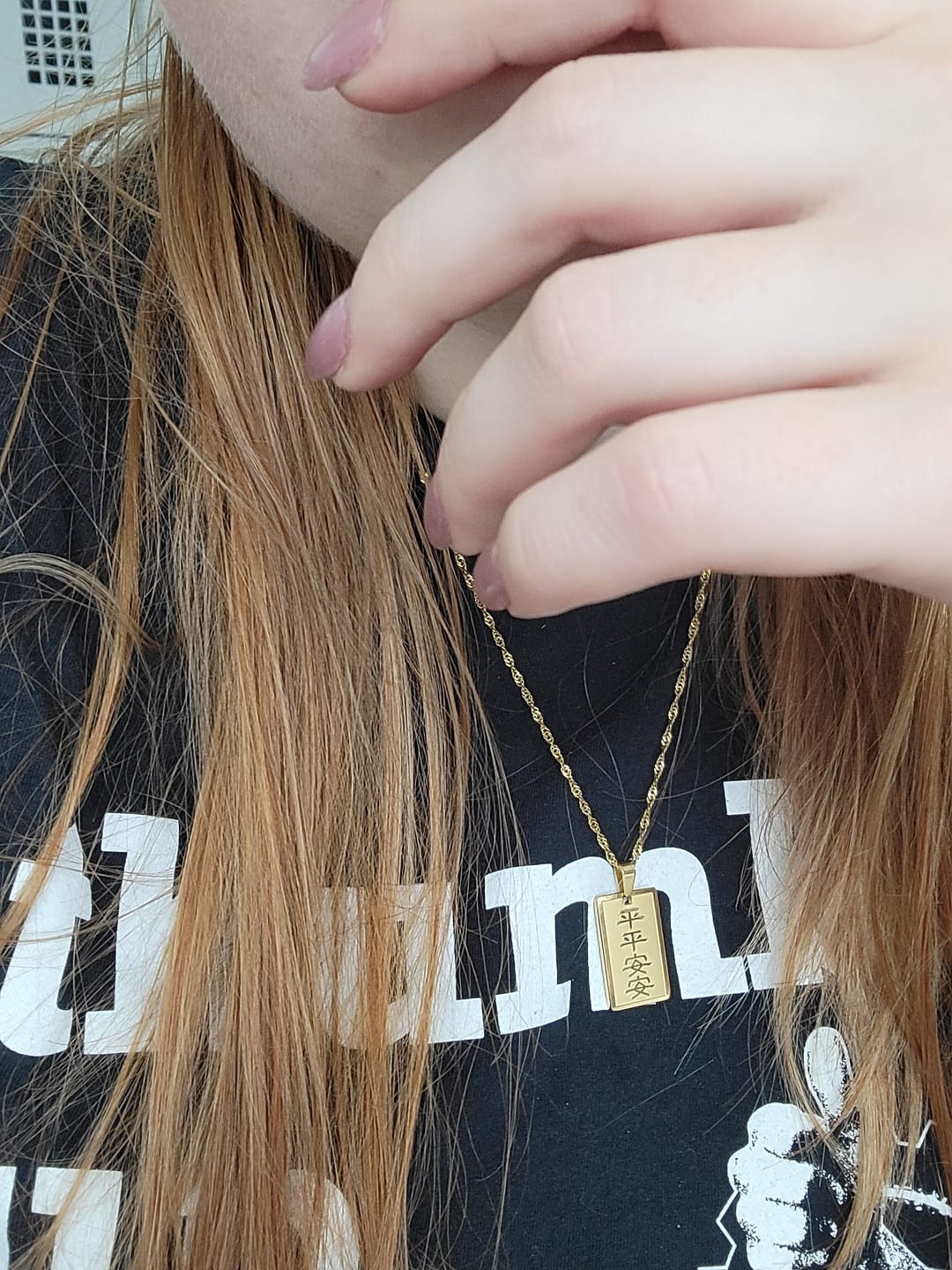 Customer photo review of Safety & Protection Good Luck Charm Necklace