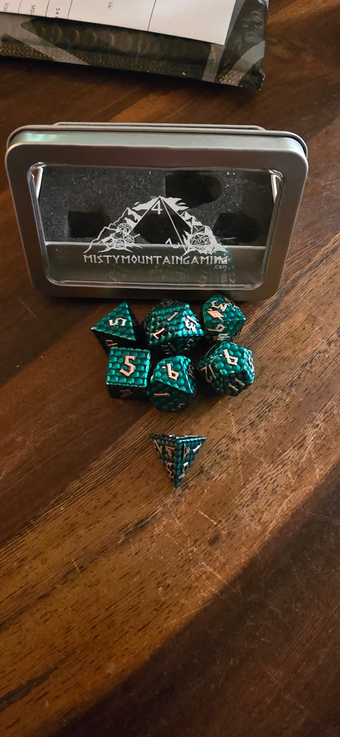 Customer photo review of Green Dragon's Egg Metal Dice Set