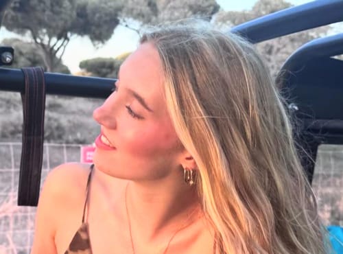 Customer photo review of Cosima Crystal Gold Star Huggie Earrings