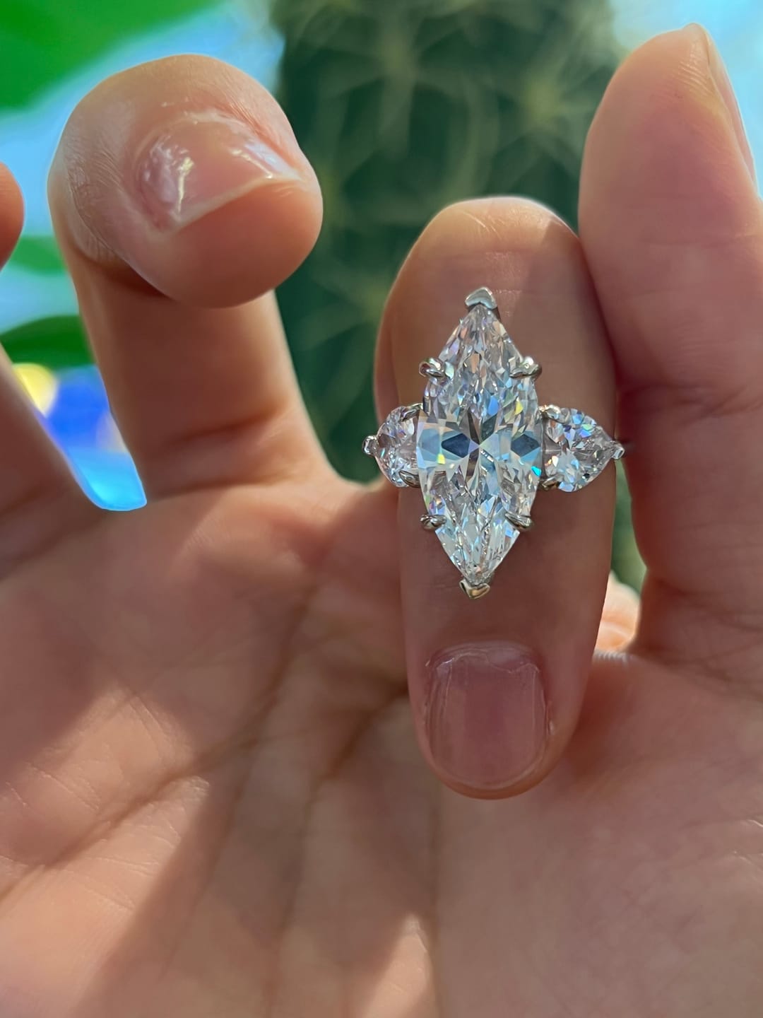 Customer photo review of Louily Marquise Cut Three Stone Engagement Ring In Sterling Silver