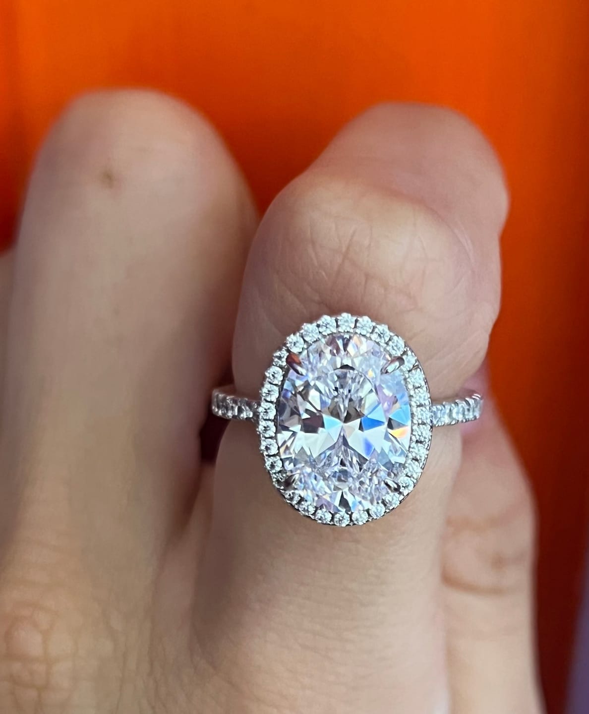 Customer photo review of Louily Halo 3.5Ct Oval Cut Simulated Diamond Engagement Ring In Sterling Silver