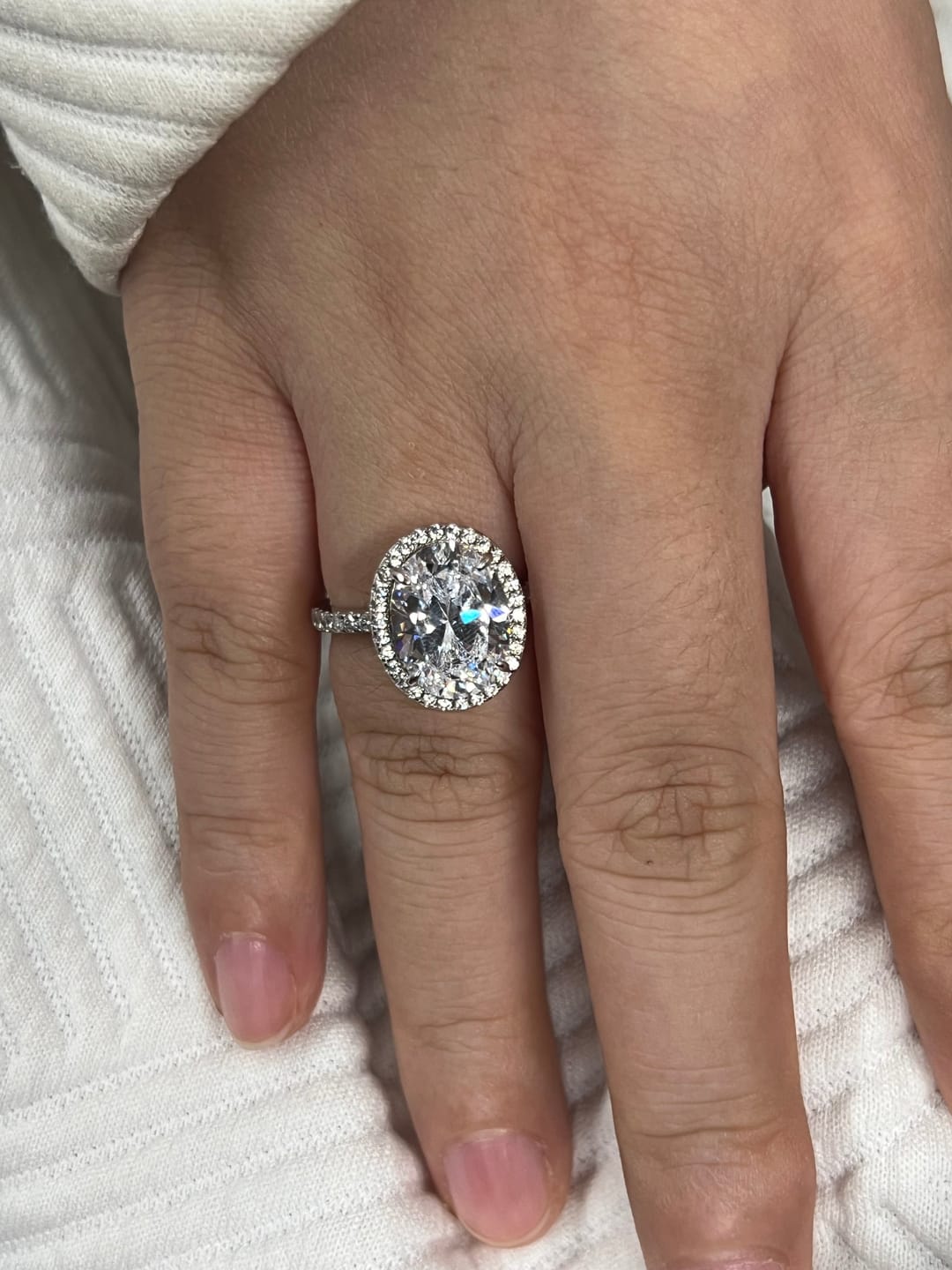 Customer photo review of Louily Halo 3.5Ct Oval Cut Simulated Diamond Engagement Ring In Sterling Silver