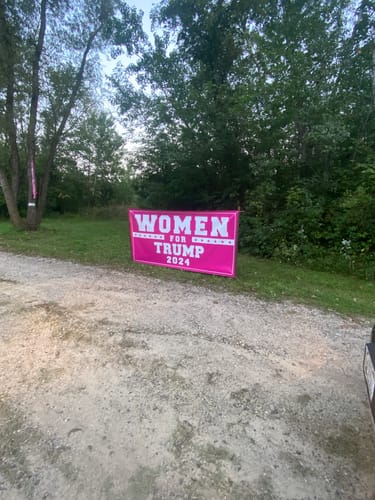 Customer photo review of Trump 2024 Banner Sign, 13 Oz Heavy Duty Waterproof Trump For President 2024, Women for Trump 2024 Pink Vinyl Banner with Metal Grommets
