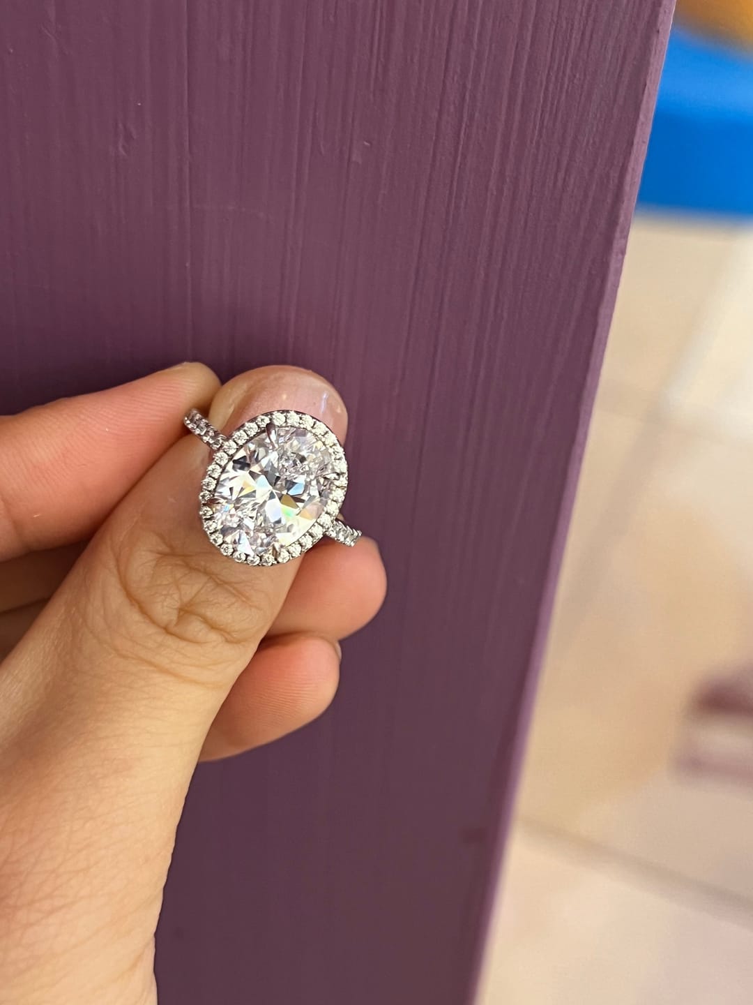Customer photo review of Louily Halo 3.5Ct Oval Cut Simulated Diamond Engagement Ring In Sterling Silver