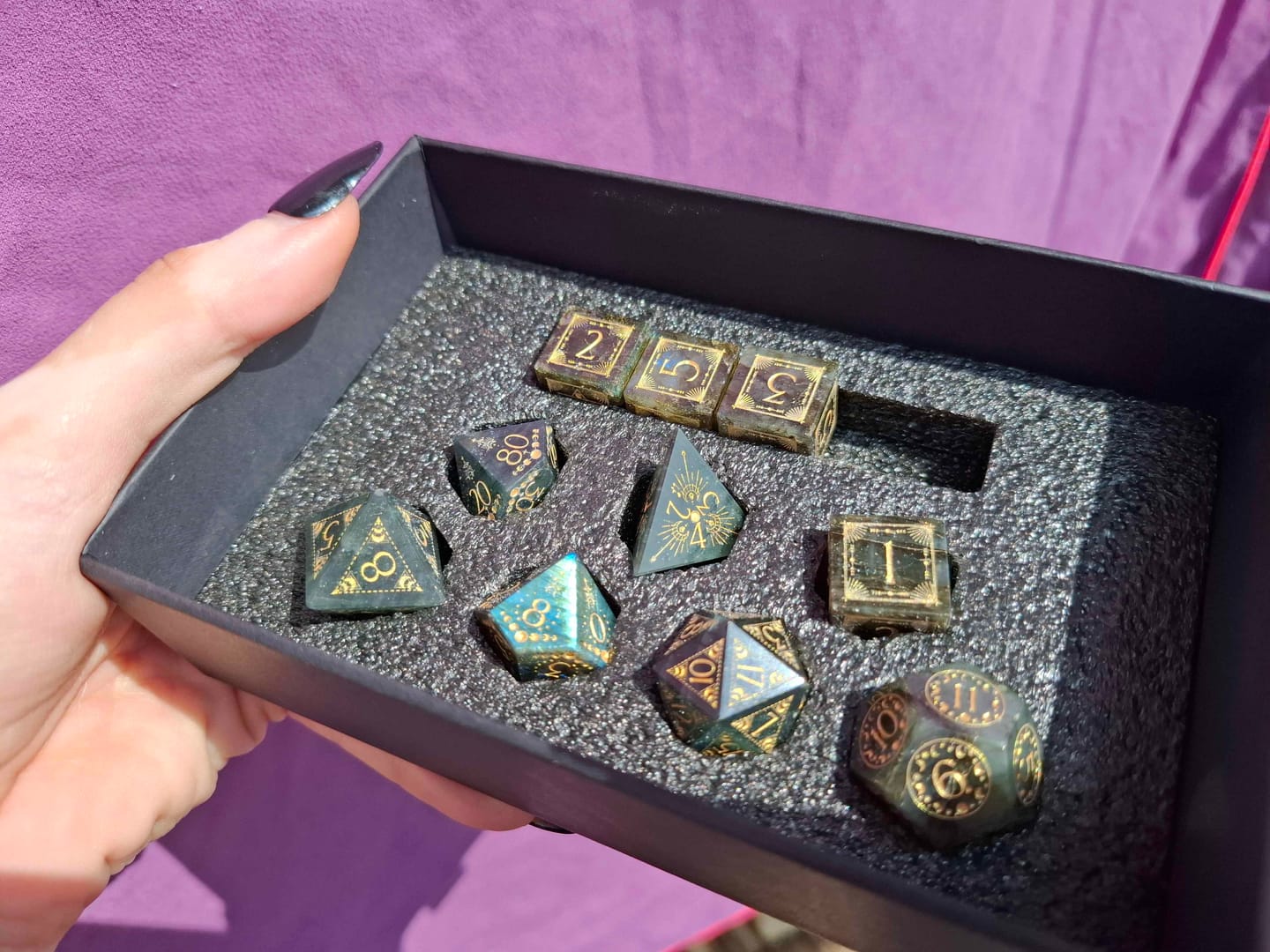 Customer photo review of URWizards D&D Labradorite Engraved Dice Set Lunar Eclipse