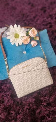 Customer photo review of Jet Set Travel Medium Logo Dome Crossbody Bag (VANILLA)