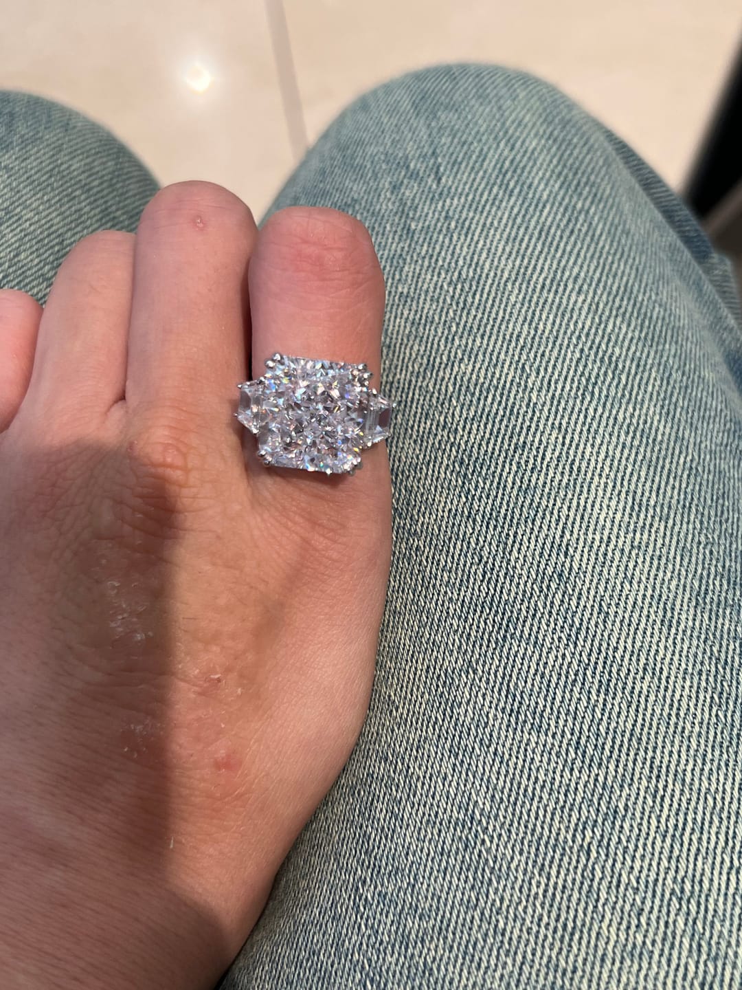 Customer photo review of S925 6.5/12.0 Ct Radiant Cut Crushed Ice Simulated Diamond Three-Stone Engagement Travel Ring