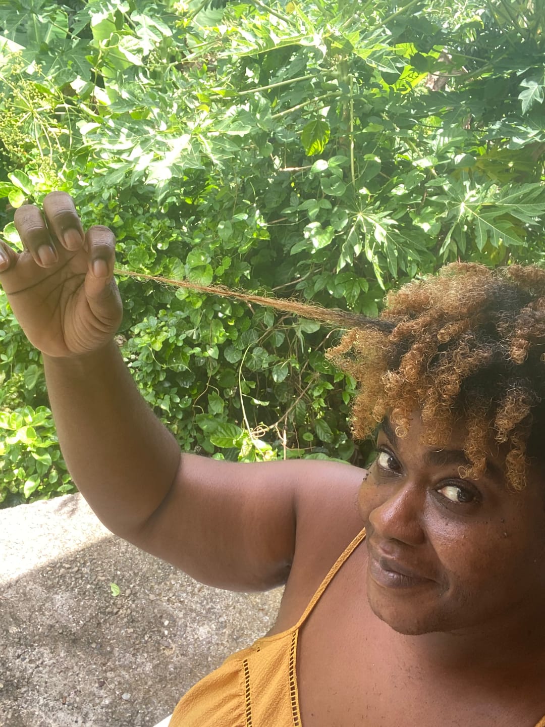 Customer photo review of Sérum Capiboost Hibiscus & Orties 120ml pour la pousse des cheveux bouclés frisés crépus