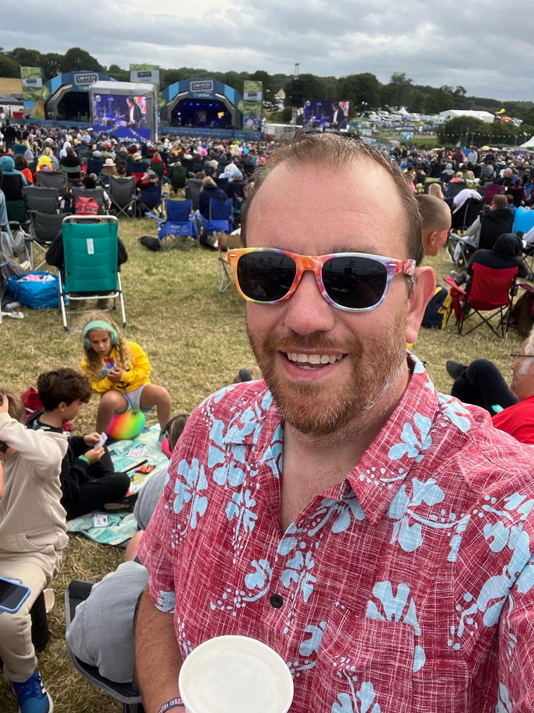 Customer photo review of Men's Red Floral Vintage Short Sleeve Button Up Beach Tropical Hawaiian Shirt