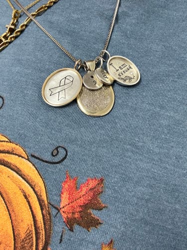 Customer photo review of Warrior Ribbon Oval Charm