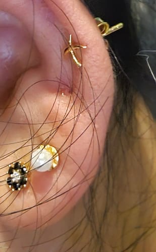 Customer photo review of Molto Kiss Stud Earrings